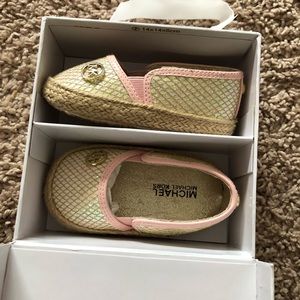 Baby Michael Kors shoes never worn. Size 4